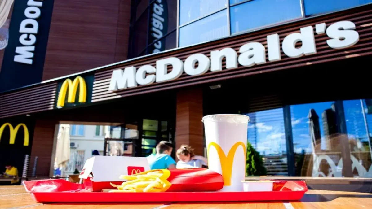McDonald's beats earnings but sees slower sales ahead amid inflation. Europe operations face challenges. Stock fluctuates on cautious outlook.