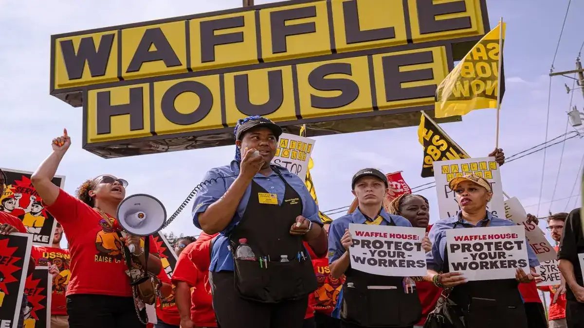 "Waffle House staff in Columbia strike over working conditions, demanding security, consistent scheduling, and an end to 'meal deductions'."