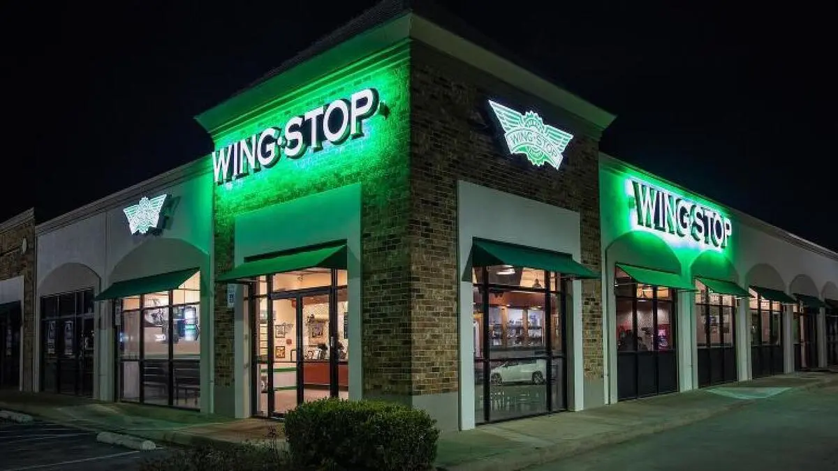 Wingstop's stock downgraded by Wedbush as rising wing costs pose risks to market share gains and future growth predictions.