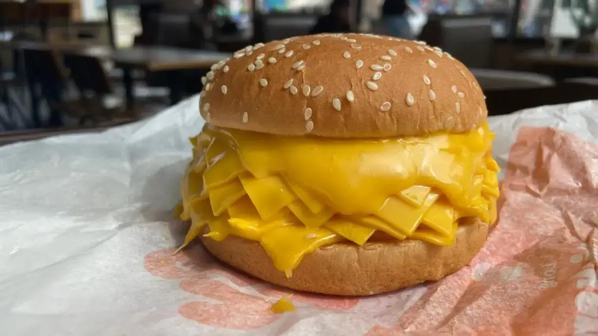 Burger King's new 'real cheeseburger' in Thailand sparks frenzy as it swaps meat for a bun packed with 20 slices of American cheese.