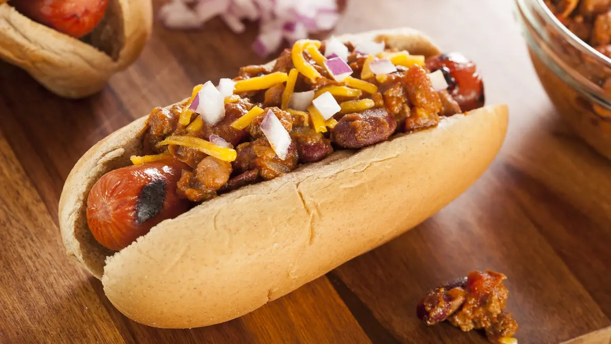 Celebrate National Chili Dog Day 2023 on July 27 with this classic American combo of hot dog and chili sauce! 🌭🌶️ Enjoy the tasty variations!