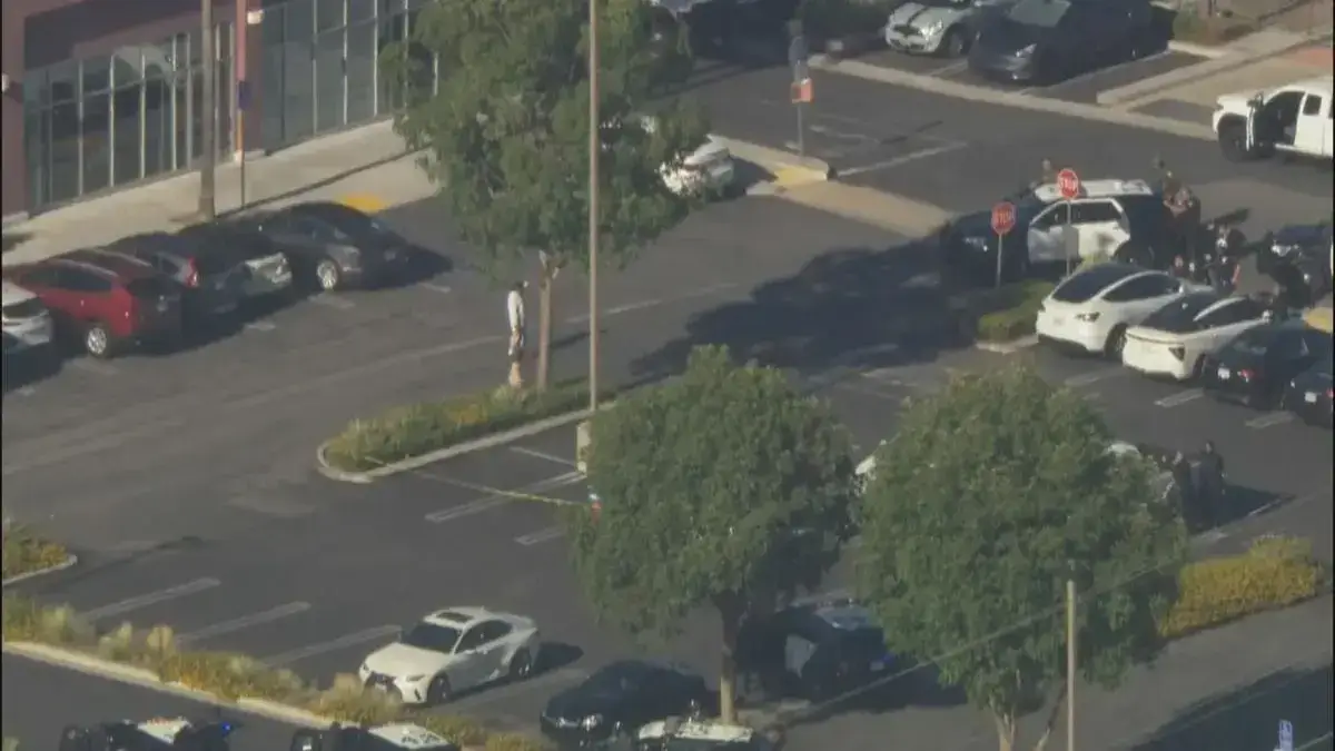 Hobby Lobby in Santa Ana evacuated as police address armed suspect situation. Surrounding area secured as negotiations unfold.